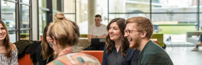 Students talking in the Liberty Building