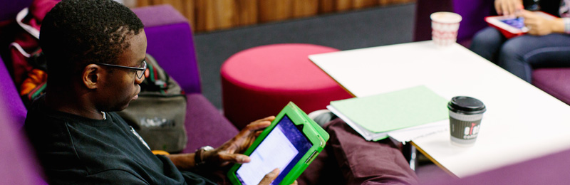 man using an ipad