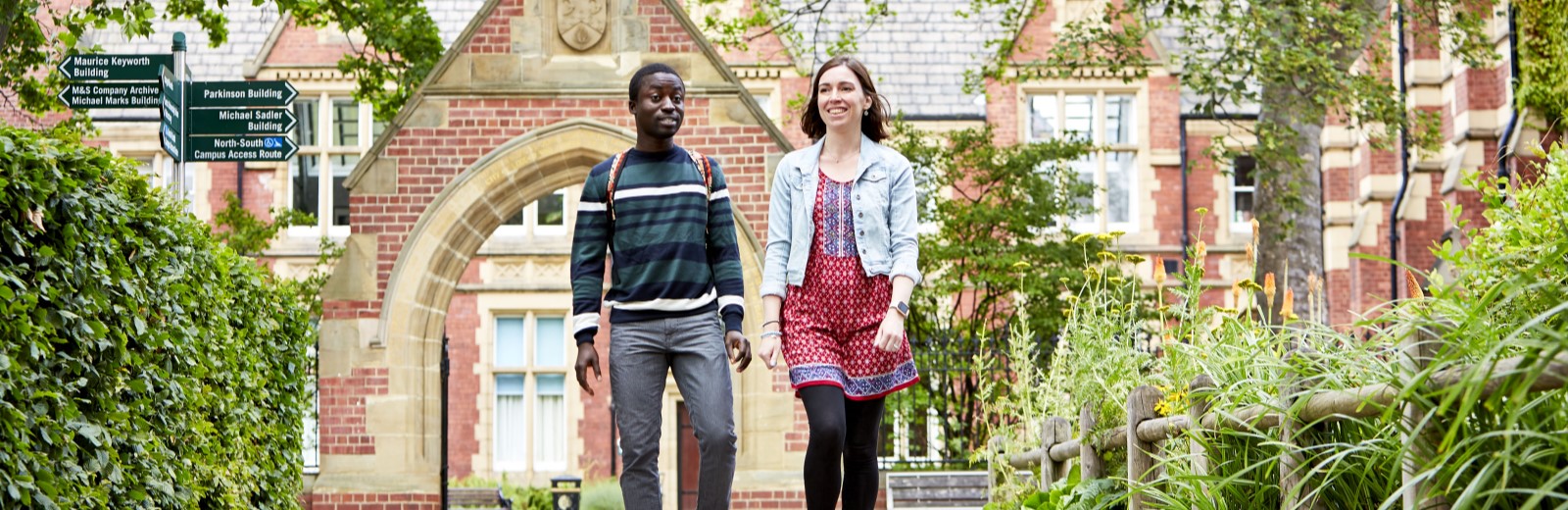 two students walking on campus