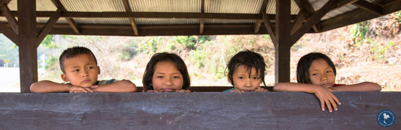 Children behind a wall
