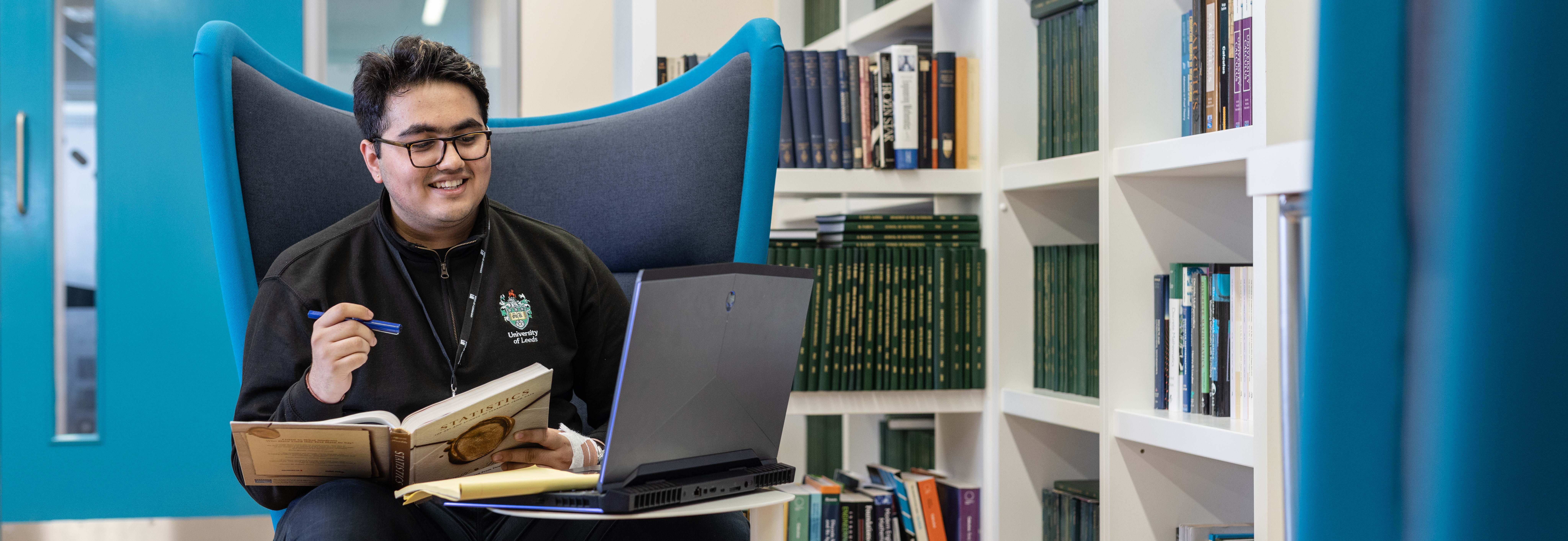 Student sitting in the maths reading room