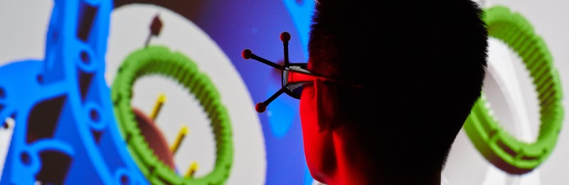 male student in engineering visualisation suite