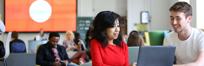 Students working in common area