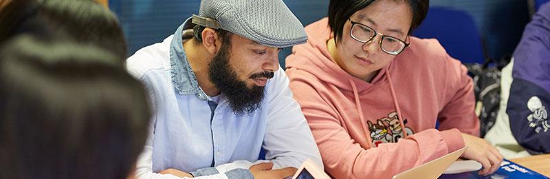 Pre-sessional students working together in class
