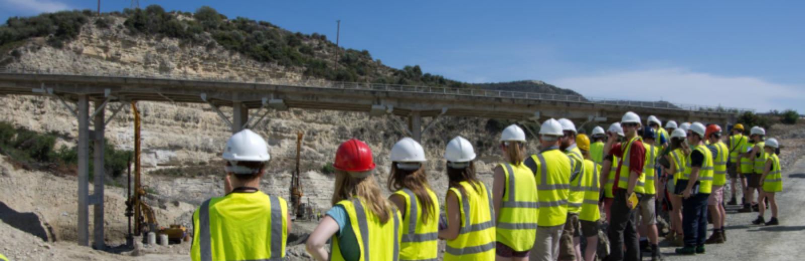 Students on a field trip studying engineering geology