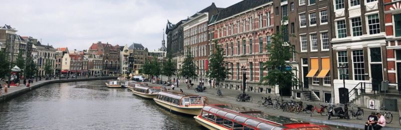 Photograph of boats on a canal in Amsterdam, taken during the European field trip.