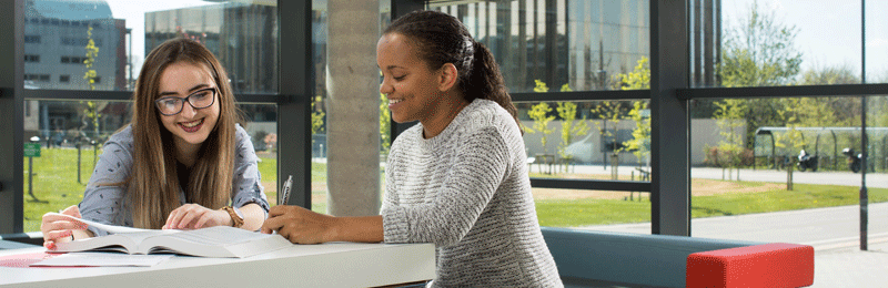 Two students studying in the Liberty Building