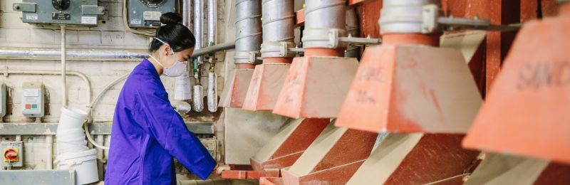 Image of a female student working in the Civil Structures and Materials Lab