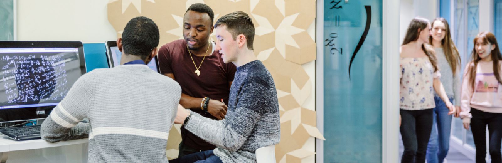 Maths students studying in the reading room