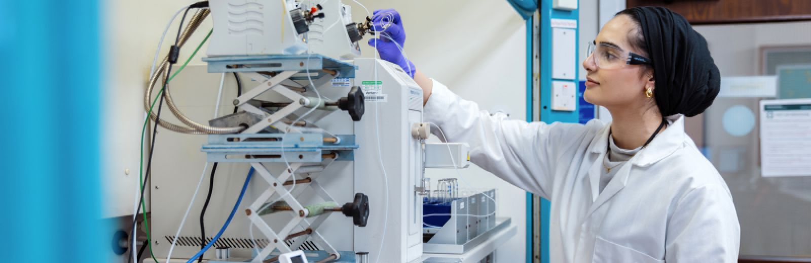 Female student doing digital chemistry experiment