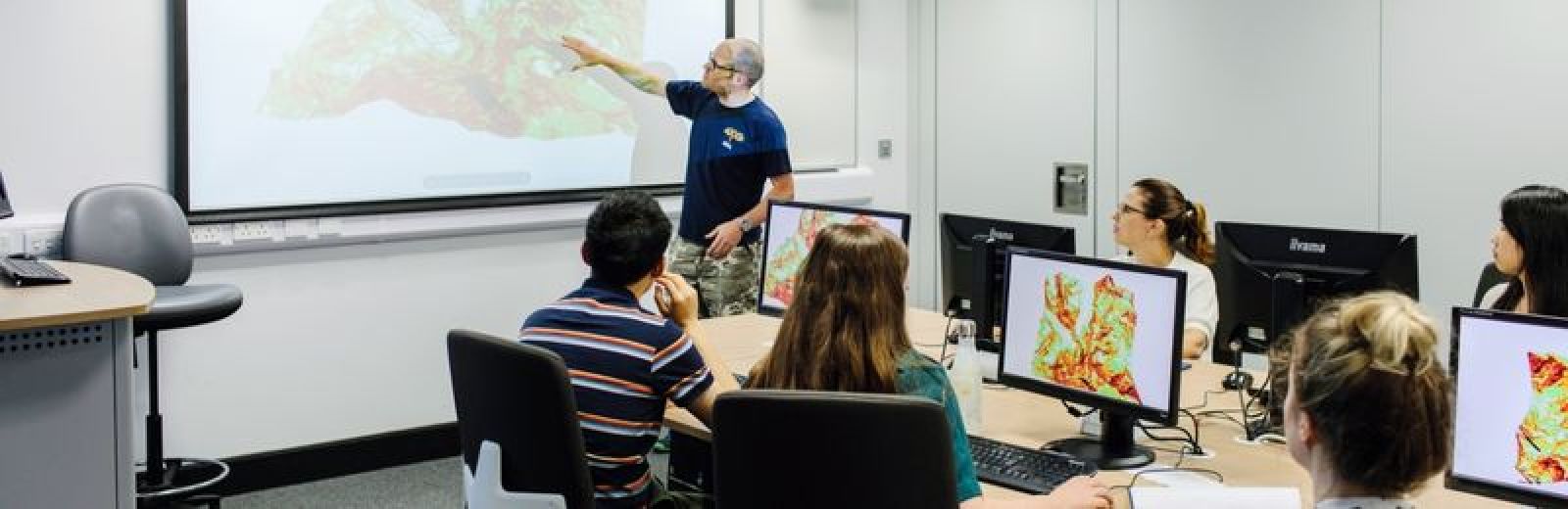 Image of PGT Geography students working in the GIS lab